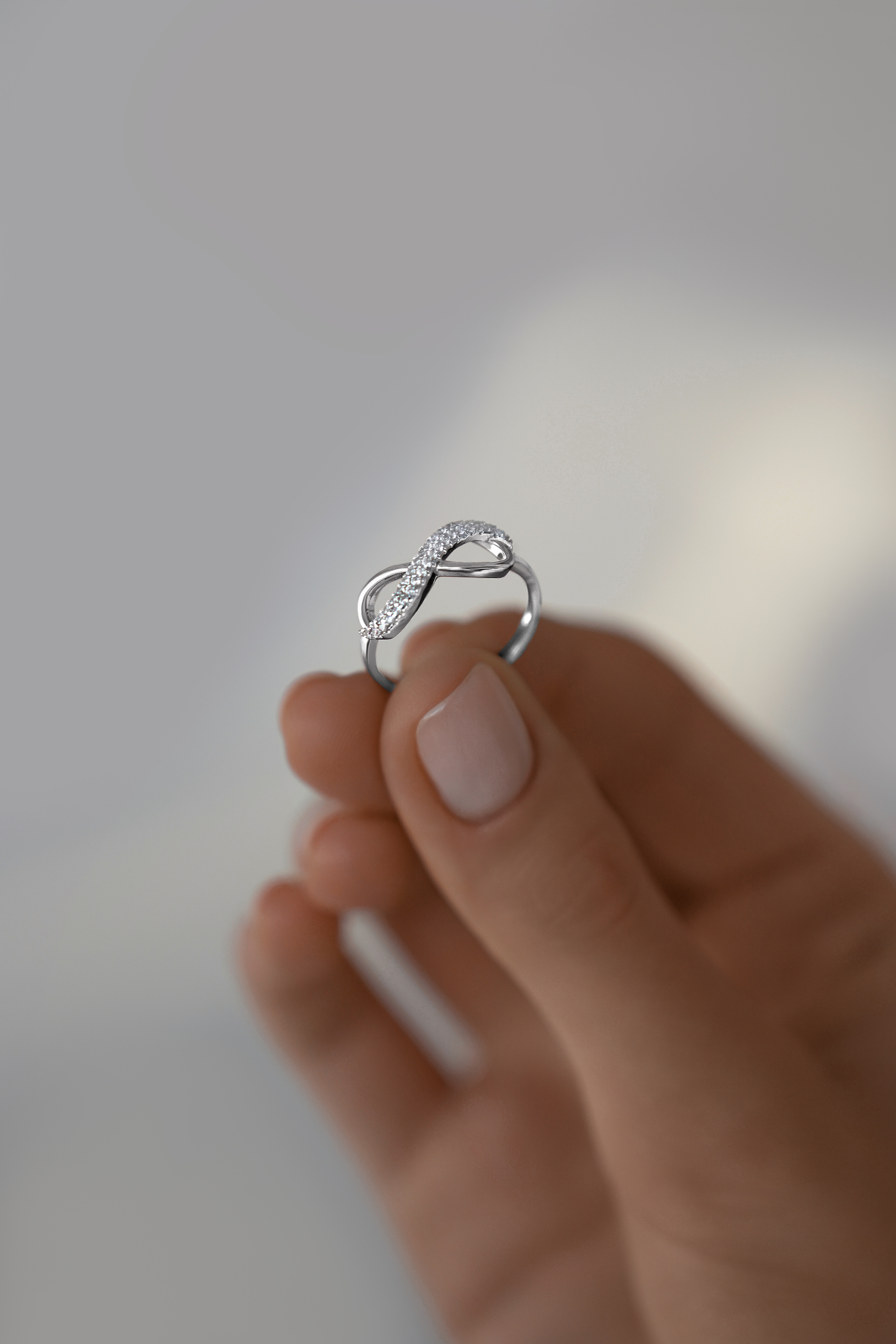 Кольца: Кольцо Бесконечность можно купить в ювелирном гардеробе MOMNT (Momentsilver), интернет-магазине украшений из серебра. Серебро 925,родий. Вставки: куб.цирконий. Артикул 
