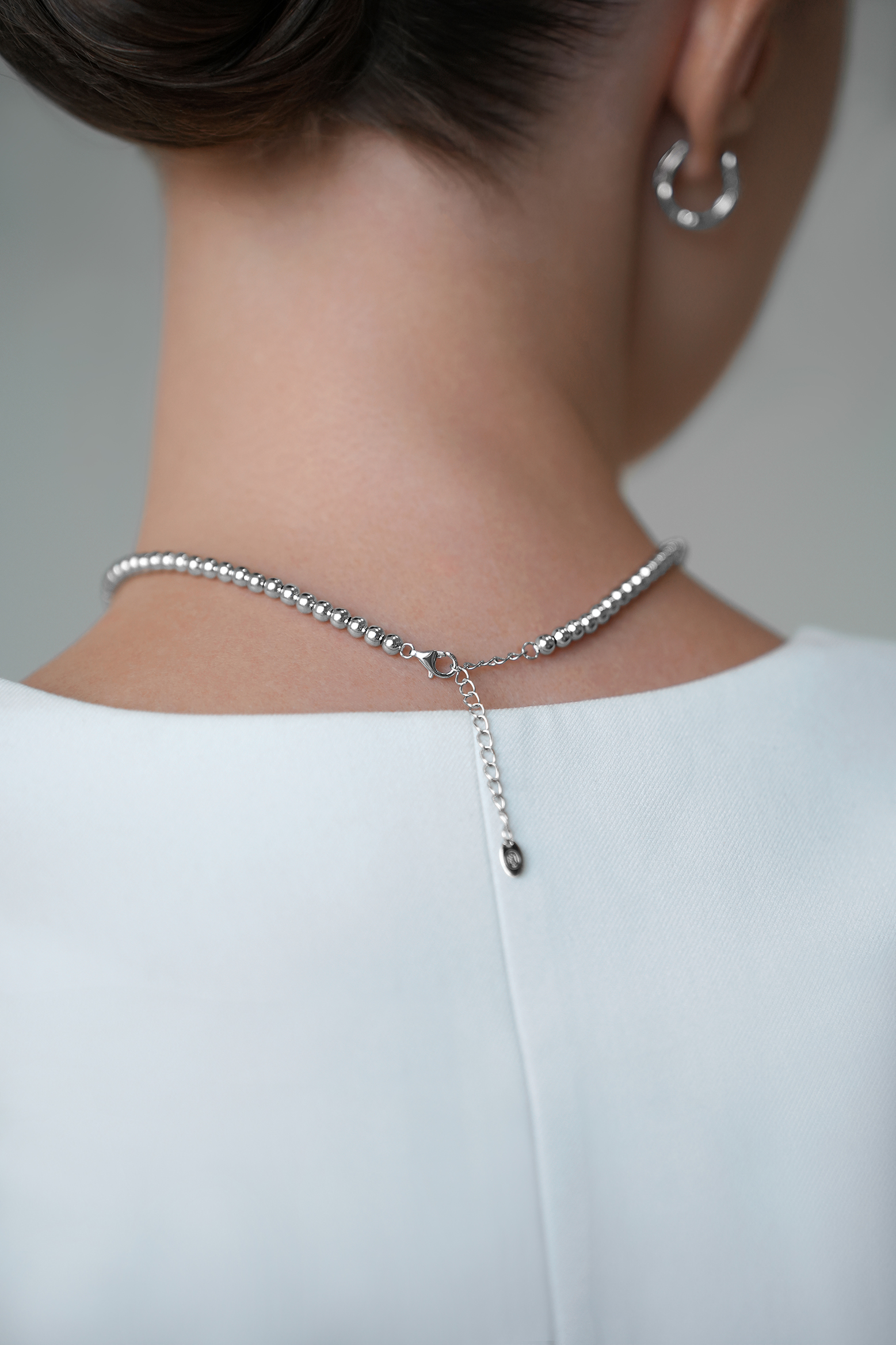 Колье: Колье из шариков с сердцем можно купить в ювелирном гардеробе MOMNT (Momentsilver), интернет-магазине украшений из серебра. Серебро 925, родий. Артикул 