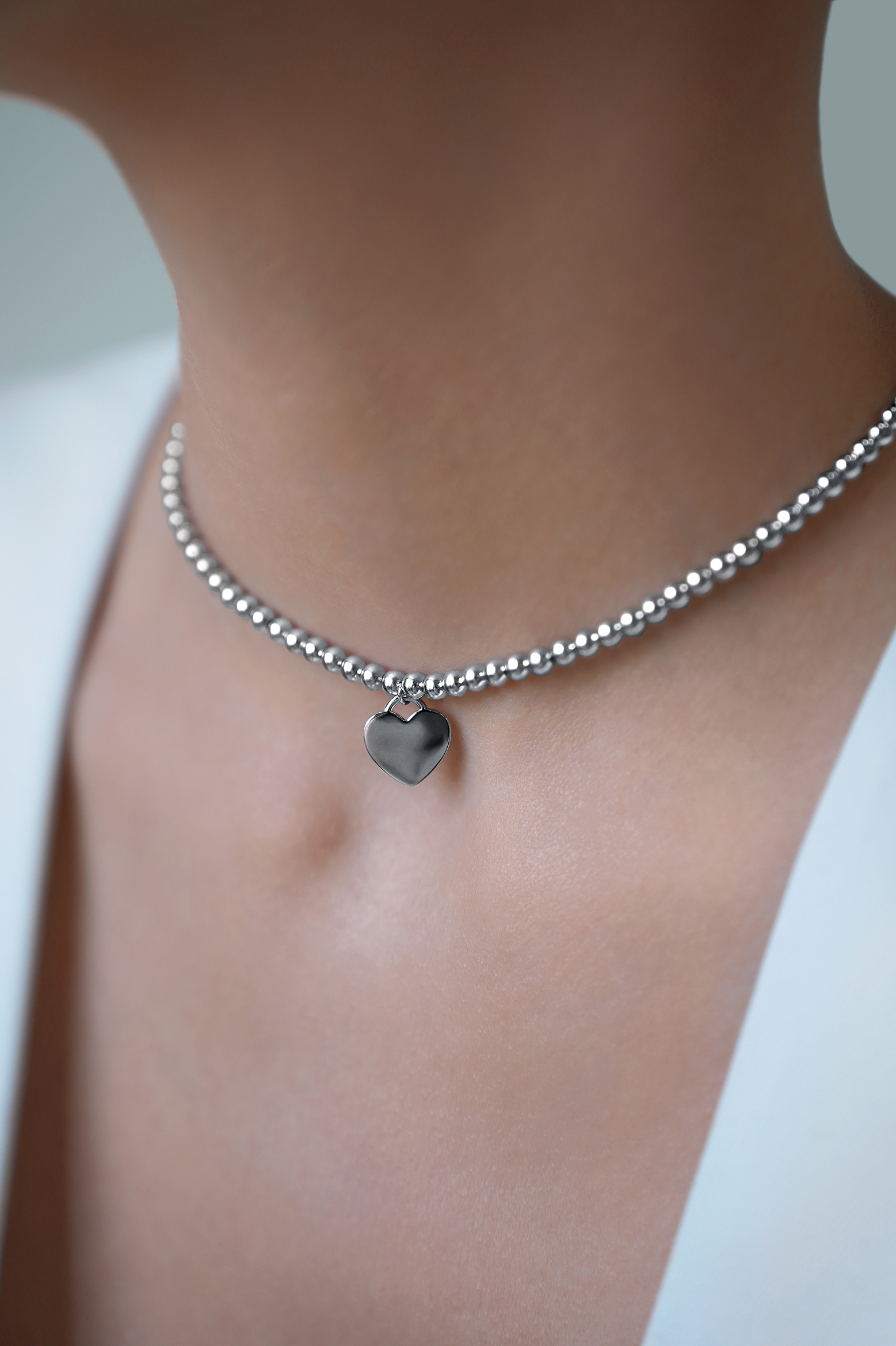 Колье: Колье из шариков с сердцем можно купить в ювелирном гардеробе MOMNT (Momentsilver), интернет-магазине украшений из серебра. Серебро 925, родий. Артикул 
